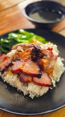 Chepo rice is Roasted duck crispy pork belly and roasted pork with rice. Street food Thai.