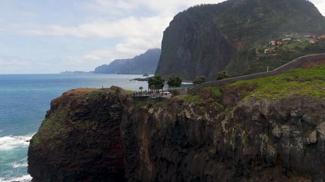 Aerial Drone Circling Shot Of Glass Observation Decks At Guindaste Cove, Faial, Madeira, Portugal.