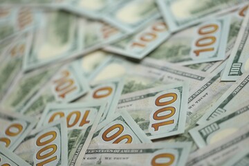 Big amount of american USD hunderd dollar bills banknotes close up