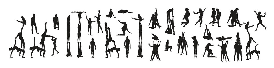 Black silhouettes of acrobats 
