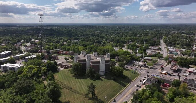 Aerial view of the Tower at McMillan and Gilbert surrounded by lush greenery and buildings, Cincinnati, OH, United States.