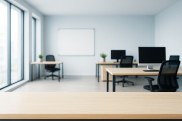 Modern empty office interior with wooden desk in foreground and computer workstations in background, bright open space concept template mockup.
