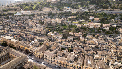 Harbor vibes in Sicily – a bird’s-eye view of yachts and boats resting on turquoise waters.