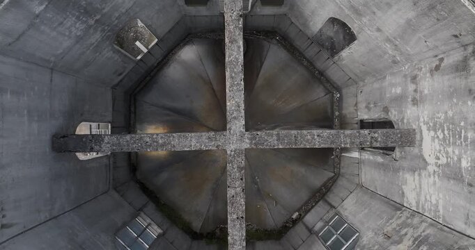 Aerial view of an octagonal building with a cross structure on the roof, showcasing textures and tones, Cincinnati, OH, United States.