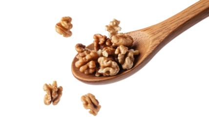 Walnuts falling from wooden spoon on transparent background