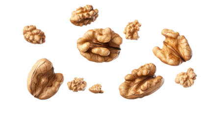 Walnuts falling on transparent background