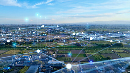 地方都市の空撮と通信ネットワークのコンセプト