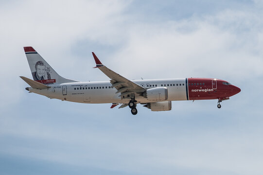 A commercial passengers flight of Norwegian Airlines flying approaching to Alicante - Elche Miguel Hernandez Airport on the 29th of August of 2025