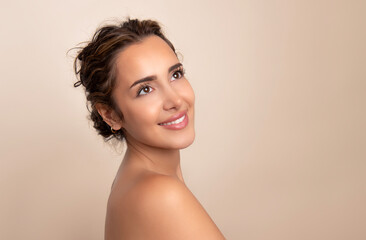 Obraz premium Beautiful young woman with pretty smile and flawless skin after skincare