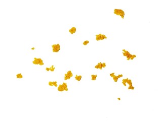 crispy fried flour crumbs flying on an isolated white background, for design, fried chicken. Fried popcorn chicken falling in the air isolated on white background.