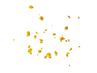 crispy fried flour crumbs flying on an isolated white background, for design, fried chicken. Fried popcorn chicken falling in the air isolated on white background.