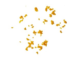 crispy fried flour crumbs flying on an isolated white background, for design, fried chicken. Fried popcorn chicken falling in the air isolated on white background.