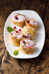 Pancakes with berries and cream cheese