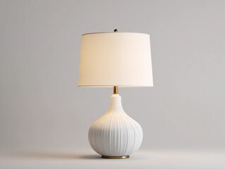 Elegant white lamp with fabric shade on display in minimalist interior setting for modern decor