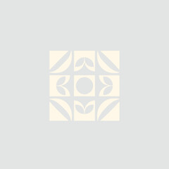 A white square featuring a decorative design in the center, showcasing intricate patterns and shapes