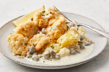 Potatoes with cauliflower and caper dressing