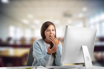 Young girl student learning on computer