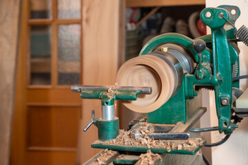 Carpentry, vintage wood lathe turning with copy space. High quality photo