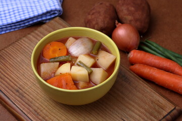 Chunky Vegetable Stew served in a yellow bowl