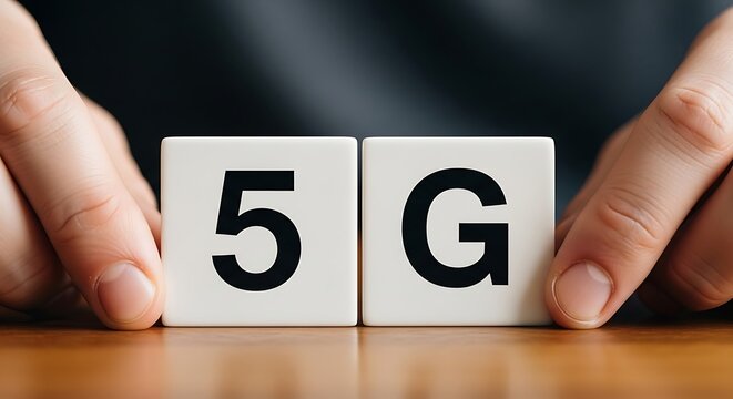 Hands adjusting white blocks with black '5g' letters for next generation wireless technology concept