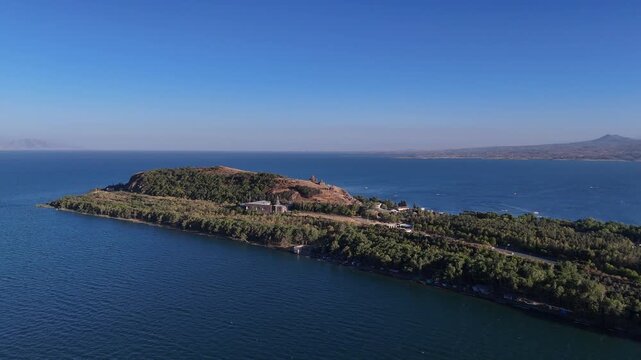 Aerial View of Lake Sevan Armenia &ndash; Mountains, Church, Waves, and Peninsula