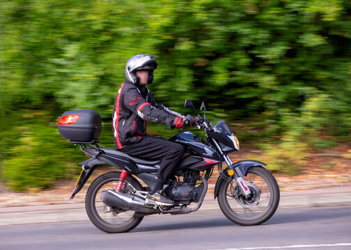 Milton Keynes,Bucks,UK - Aug 31st 2025:  2020 Honda glr motorcycle driving on a British road