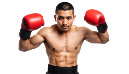 A muscular boxer stands confidently with red gloves, ready to engage in a match, showcasing strength and determination.