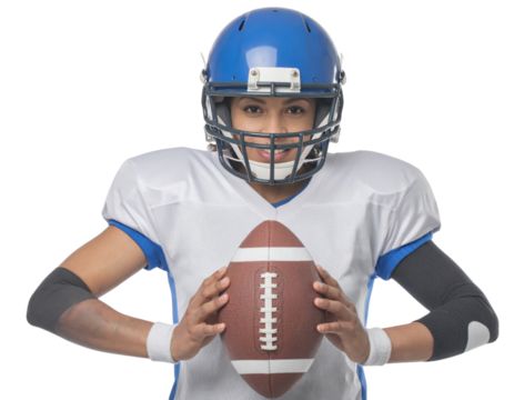 A football player in a blue helmet and white jersey confidently holds a brown football, showcasing determination and readiness.