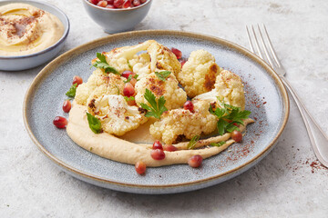 Roasted cauliflower with hummus
