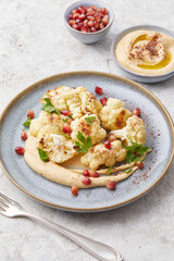 Roasted cauliflower with hummus