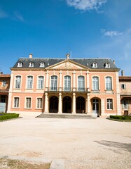 Obraz premium Elegant, historic, light peach colored building