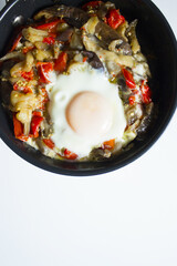Cooked vegetables with poached egg