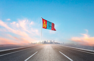 Mongolia national flag with mast waving with beautiful skyline. A view from highway. Mongolia flag...