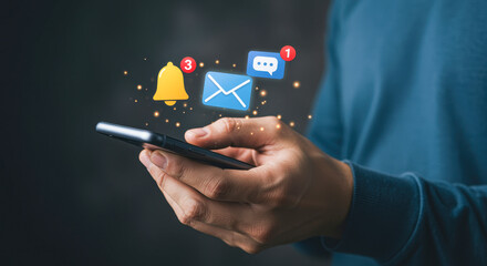 Person holding smartphone with notification icons for messages and alerts email social media