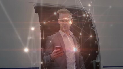 Animation of data processing over caucasian businessman using smartphone