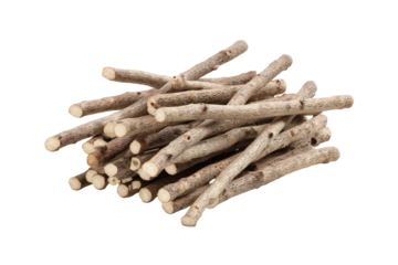 A pile of small, light gray wooden sticks.  Close-up view of numerous slender,  light-gray wooden sticks tightly clustered together.  Rounded ends. 