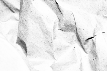 Abstract grunge black and white distressed texture torn crumpled paper overlay background