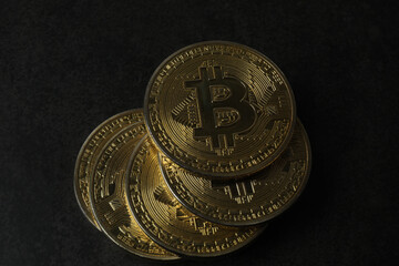 bitcoin gold, money on black background
