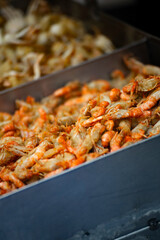a unique Taiwanese seafood snack—fried mantis shrimp