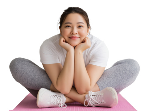 Smiling curvy asian woman relaxing in butterfly yoga pose image isolated transparent. Easy stretching female with chin resting on hands on mat cut out photo png. Body positivity cutout
