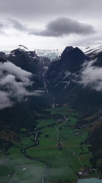 Aerial of Briksdalsbre hiking area near Oldevatnet lake, Stryn, Vestland, Norway on a cloudy day