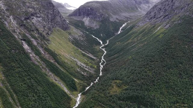 Aerial footage of Melkevollelva River and Briksdalsbreen glacier in Stryn, Vestland county, Norway
