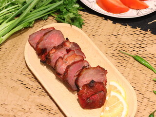 Honey roasted red pork, tender and juicy with a glossy sweet glaze, a delicious Asian-style dish served as a savory and aromatic delicacy.