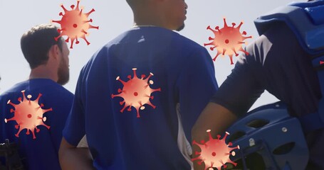 Animation of virus cells over diverse male baseball players - Powered by Adobe