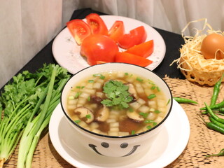 Stir-fried seafood with holy basil served over rice, a spicy and aromatic Thai street food dish packed with shrimp, squid, and fish.