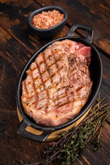 Roast pork tender loin steak, neck meat. wooden background. top view