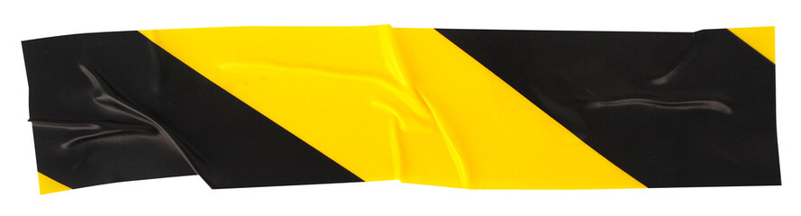Crumpled torn pieces of black and yellow striped hazard tape, adhesive sealing tape, sticky torn plastic on transparent background, caution tape