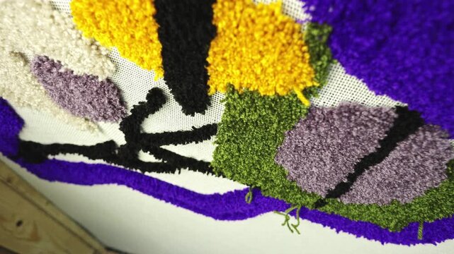 Process of carpet making with tufting gun
