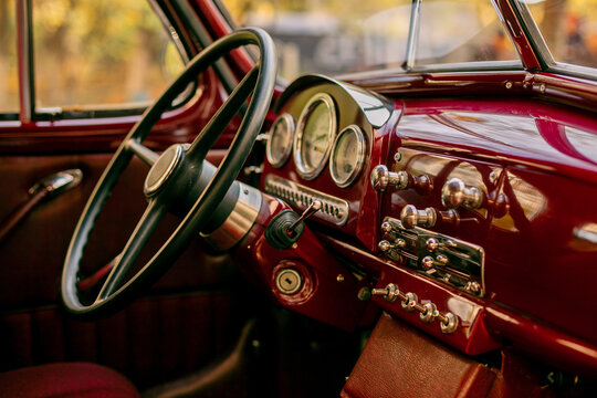 Fototapeta Vintage Car Interior with Classic Dashboard