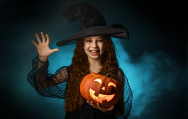 girl with Halloween pumpkin
